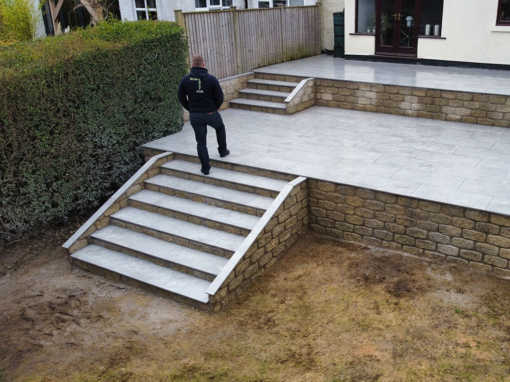 Grey porcelain patio and-stone steps