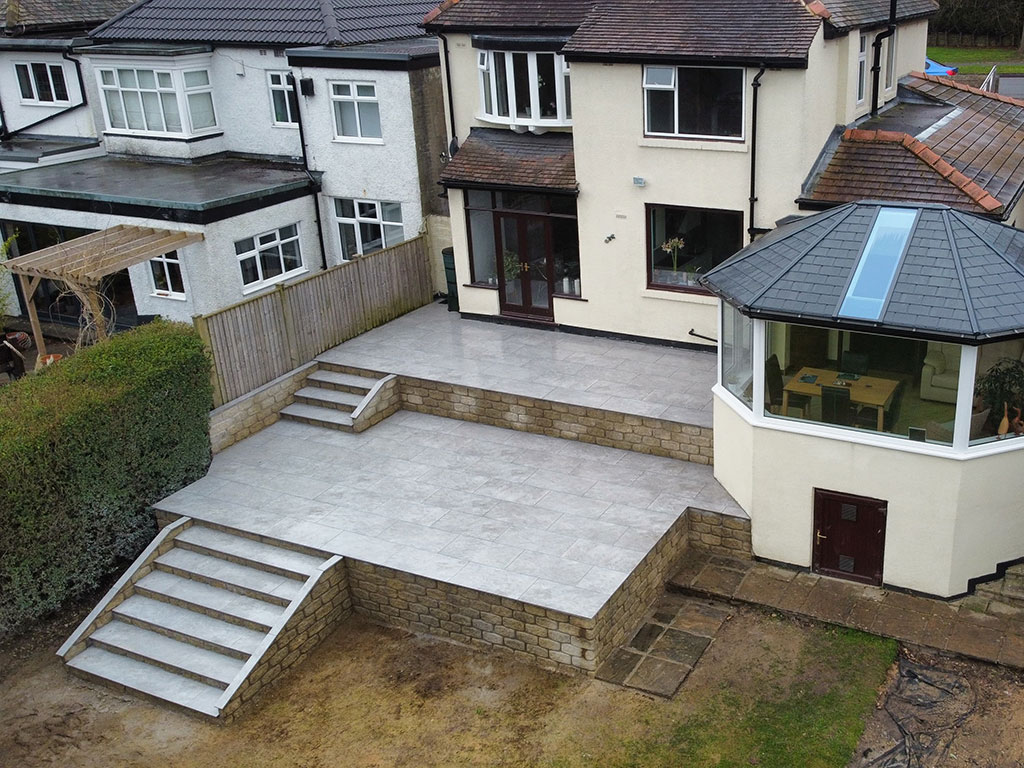 Grey porcelain patio and-stone steps